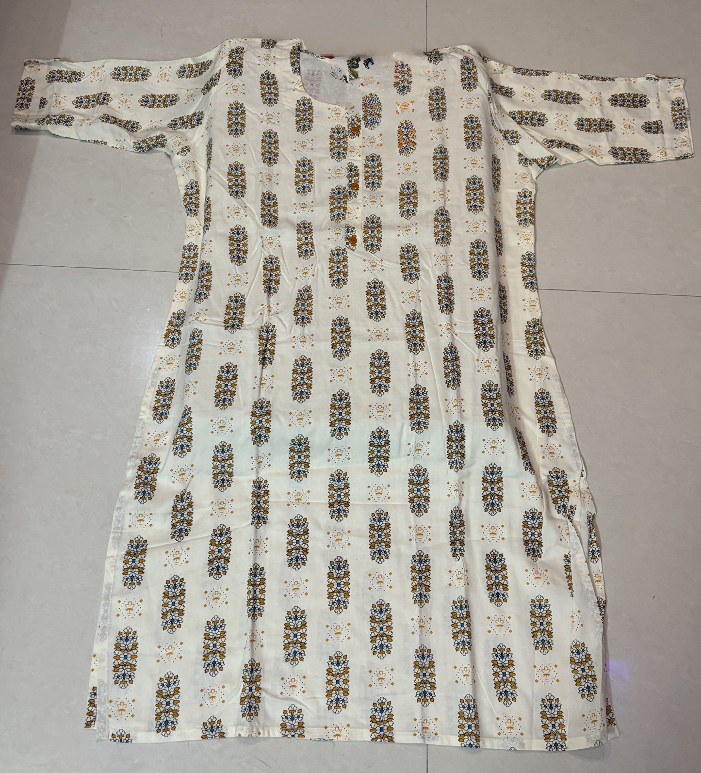 Cream Ornamental Printed Kurti – Light & Graceful