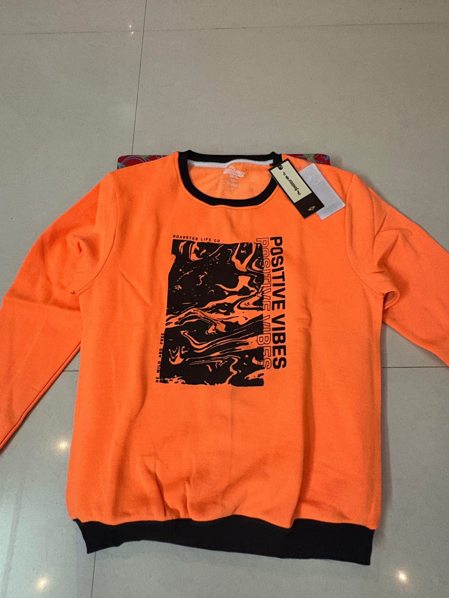 Orange "Positive Vibes" Sweatshirt – Black Collar & Abstract Graphic