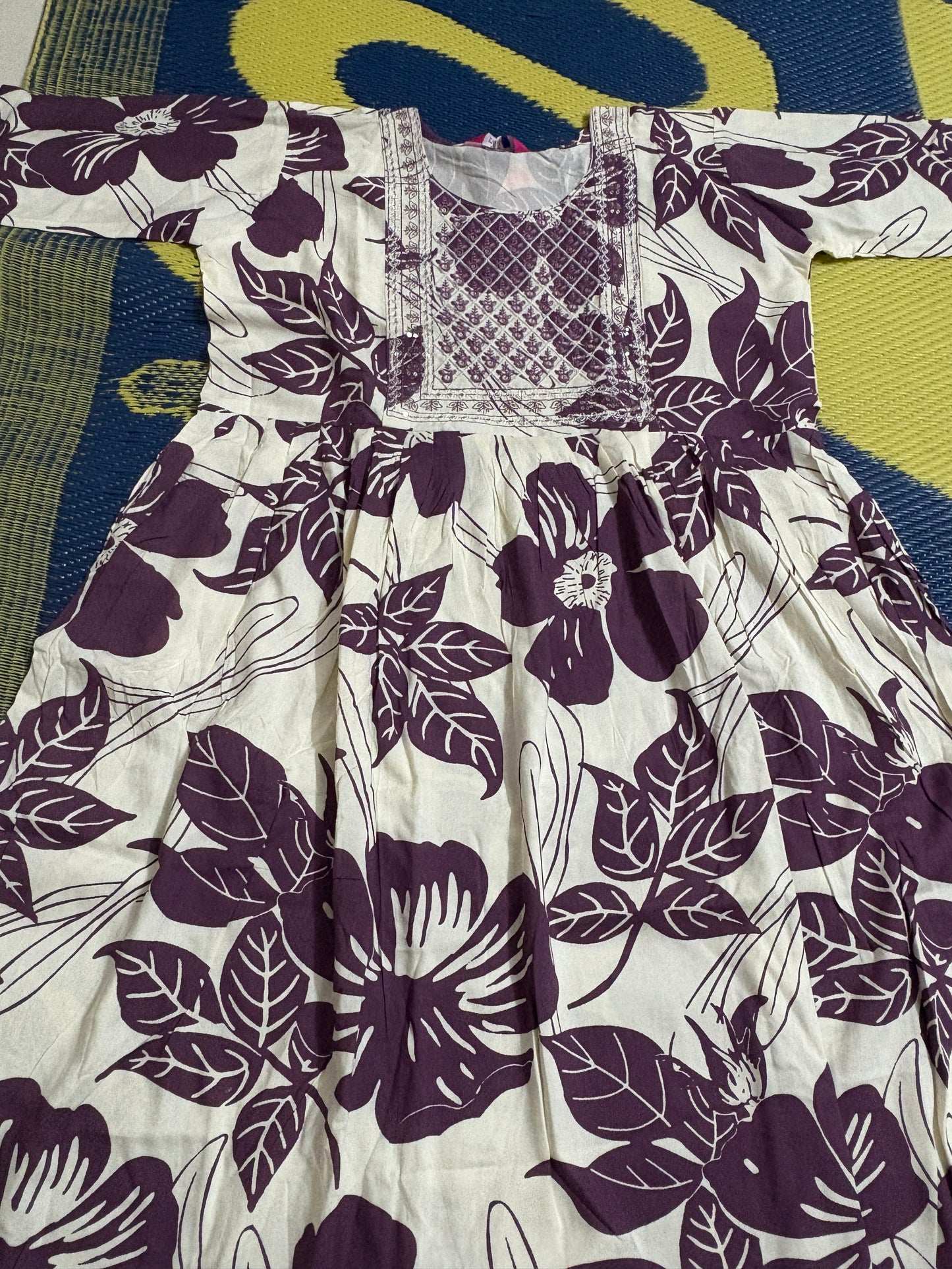 White Kurti with Purple Floral Print & Embroidered Neckline – Elegant Everyday Wear