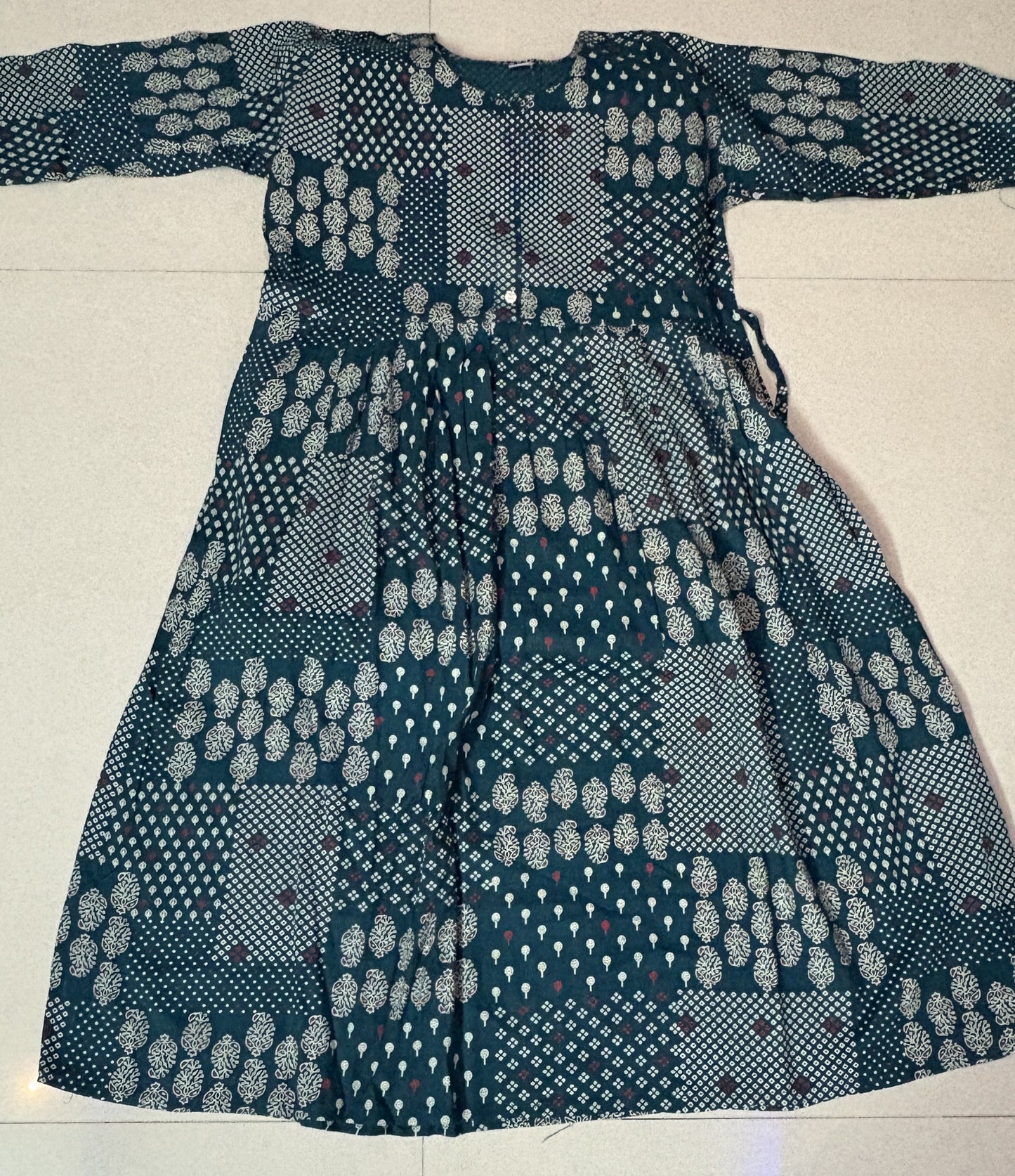 Green Patchwork Printed Kurthi – Elegant Full-Length Flared Design